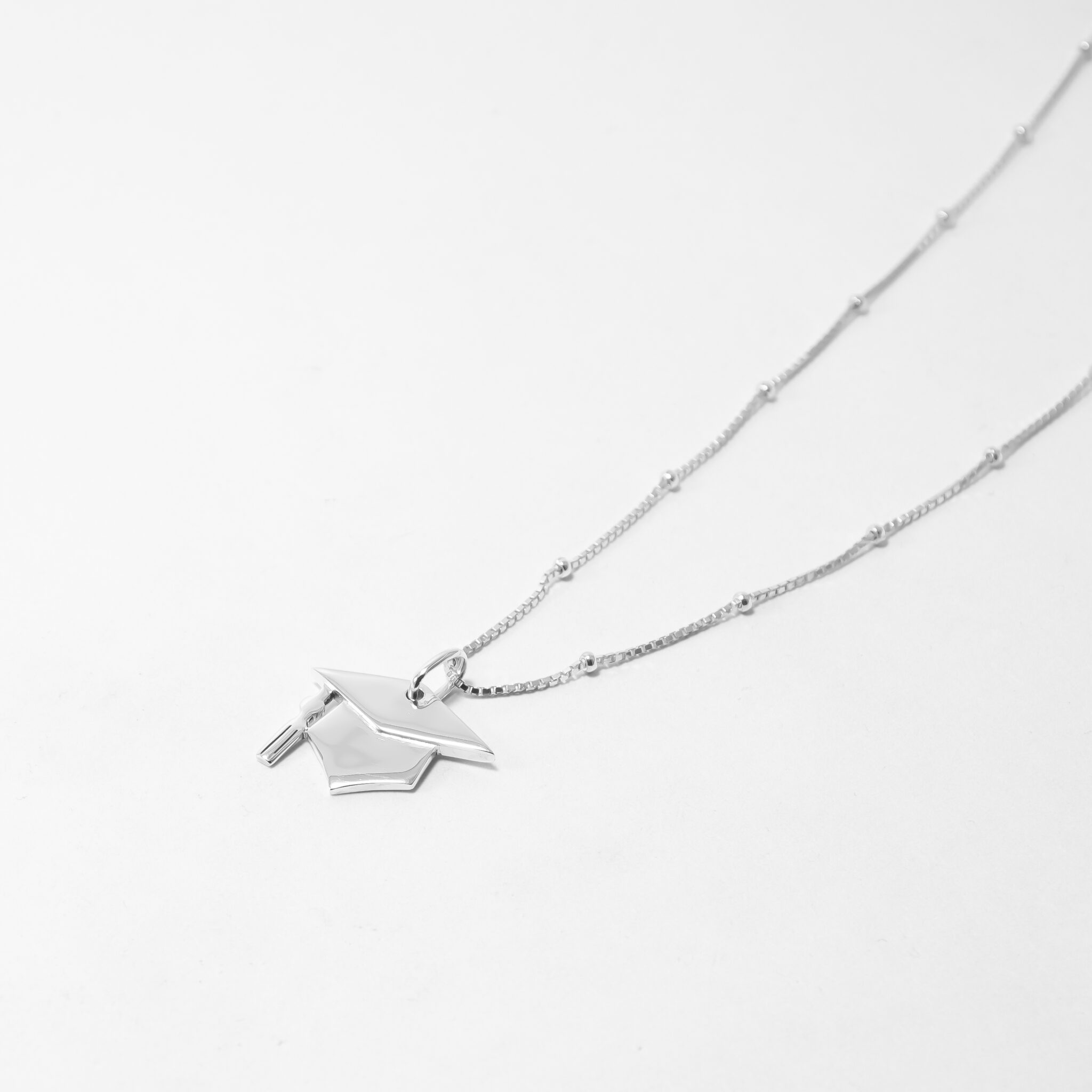 SCHOLAR LUSTRE EMBLEM