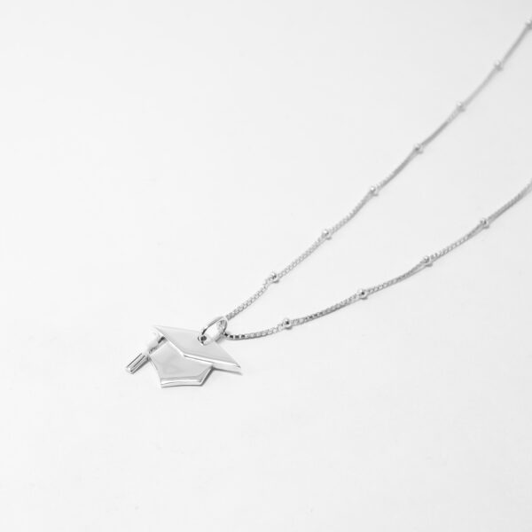 SCHOLAR LUSTRE EMBLEM